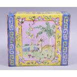 A CHINESE FAMILLE ROSE SQUARE FORM PORCELAIN PILLOW, painted with a panel of a deer in an outdoor