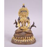 A SMALL 20TH CENTURY TIBETAN GILDED BRONZE BUDDHA, 10cm.