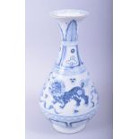 A CHINESE BLUE AND WHITE PORCELAIN YUHUCHUN VASE, the body painted with kylin, 30cm high.