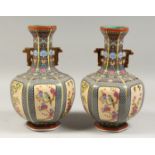 A PAIR OF CHINESE PORCELAIN HEXAGONAL VASES 12ins high.