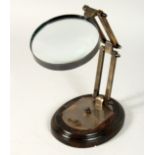 A MAGNIFYING GLASS on a stand.