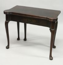 A VERY GOOD GEORGE II MAHOGANY TILT TOP TABLE with shaped ends, single of drawer, supported on