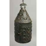 A PUNCHWORK TIN CIRCULAR LANTERN. 8.5ins high.