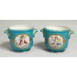 A GOOD PAIR OF 19TH CENTURY SEVRES PORCELAIN POTS, pale blue ground, edged in gilt and painted