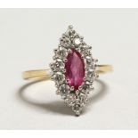 AN 18CT GOLD RUBY AND DIAMOND MARQUISE RING.