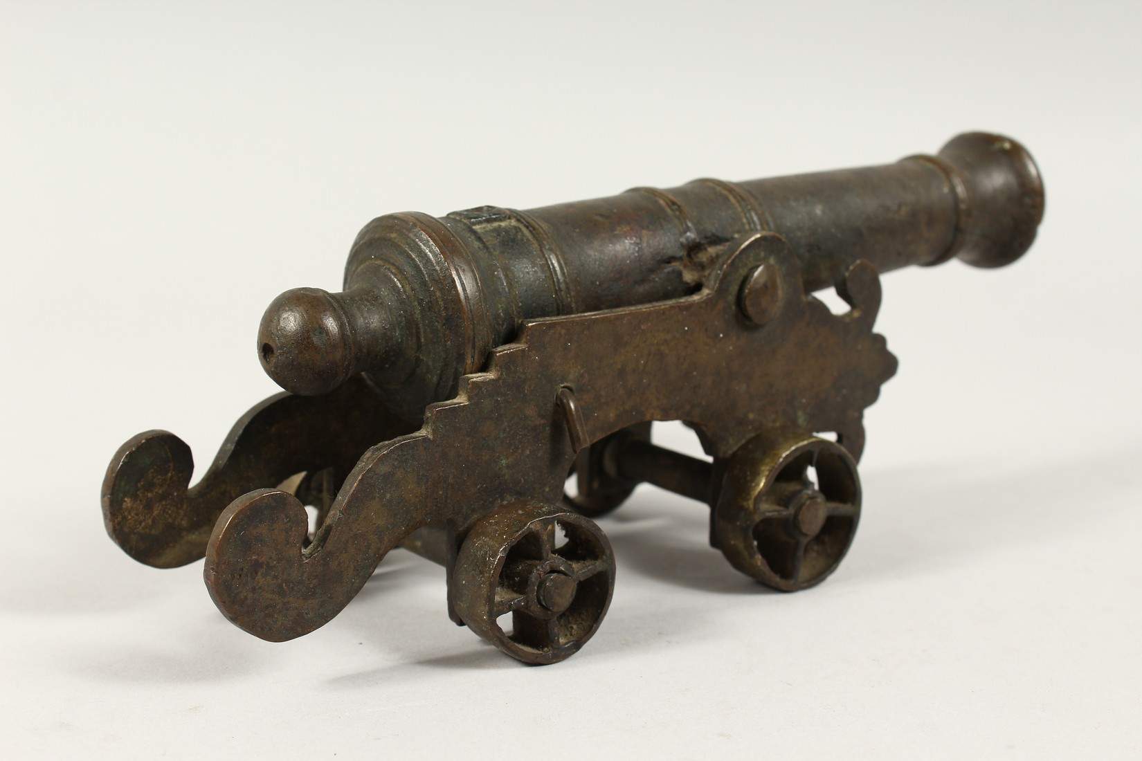 A SMALL EARLY BRONZE STARTER CANNON on bronze stand. 10ins long. - Image 2 of 2