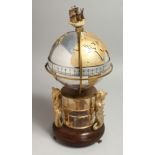 A GOOD ST JAMES HOUSE COMMEMORATIVE ANNULAR CLOCK, circa. 1984, No. 181/1500. The globe revolves,