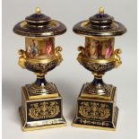 A SUPERB PAIR OF 19TH CENTURY VIENNA URN SHAPED VASES, COVERS AND BASES, rich blue ground with