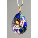 A RUSSIAN SILVER AND ENAMEL EGG PENDANT, 2.5cm