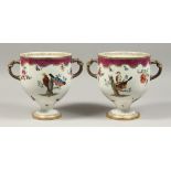 A GOOD PAIR OF TWO HANDLED ICE PAILS with knot handles and painted with birds. Cross swords mark