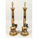 A PAIR OF TOLE CHINESE PATTERN LAMPS. 23ins high.