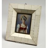 DUPRE. A HALF LENGTH PORTRAIT OF A LADY. 8cm x 6cm on an ivory banded frame. Signed