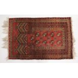 A SMALL BOKHARA PRAYER RUG. 4ft x 2ft 8ins.
