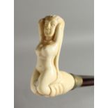 A WALKING STICK WITH BONE HANDLE OF A NUDE. 34ins long.