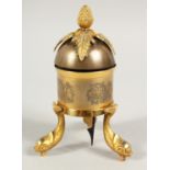 A TABLE BELL with pineapple finial on three dolphin feet. 6ins high