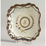A WORCESTER SQUARE PORCELAIN DISH with blue and gilt border. Crescent mark in blue 9ins high.