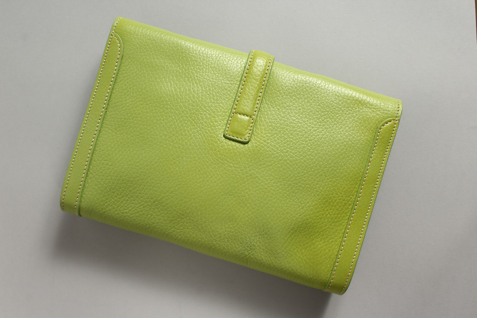 A GREEN LEATHER CLUTCH BAG and strap. 24cm long x 17cm high. - Image 2 of 6