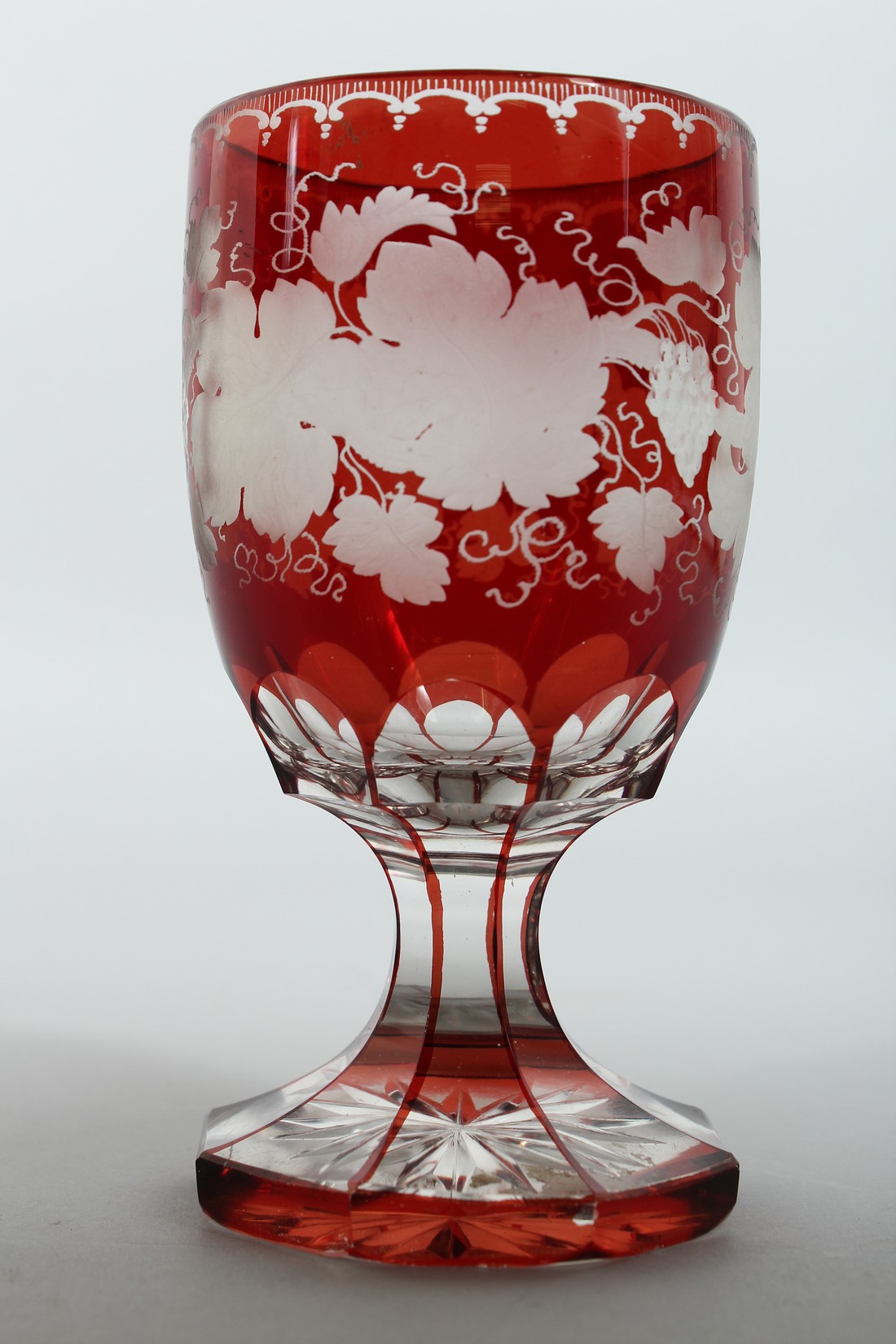 A GOOD BOHEMIAN GOBLET ENGRAVED WITH FRUITING VINES on an octagonal base. 5.5ins high. - Image 2 of 7