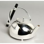 A CHRISTOPHER DRESSER DESIGN SILVER-PLATED CIRCULAR TEA POT.