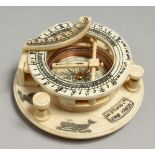 AN ETCHED BONE CIRCULAR COMPASS, 10cm diameter.