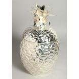 A SILVER-PLATED PINEAPPLE ICE COOLER. 13ins high.