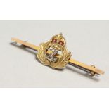 A 9CT GOLD NAVY BAR BROOCH.