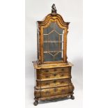A GOOD 19TH CENTURY DUTCH WALNUT AND FLORAL MARQUETRY BOMBE CABINET ON CHEST, with an unusual carved