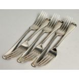 A SET OF SIX DESSERT FORKS. London, 1927, weight, 9ozs.