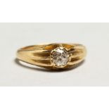 AN 18CT GOLD DIAMOND SET RING