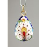 A RUSSIAN SILVER AND ENAMEL EGG PENDANT, 2.5cm.