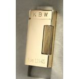 A 14CT GOLD DUNHILL LIGHTER, No. B1999, with inscription KBW, Nov. 1, 1945. in a Dunhill box.