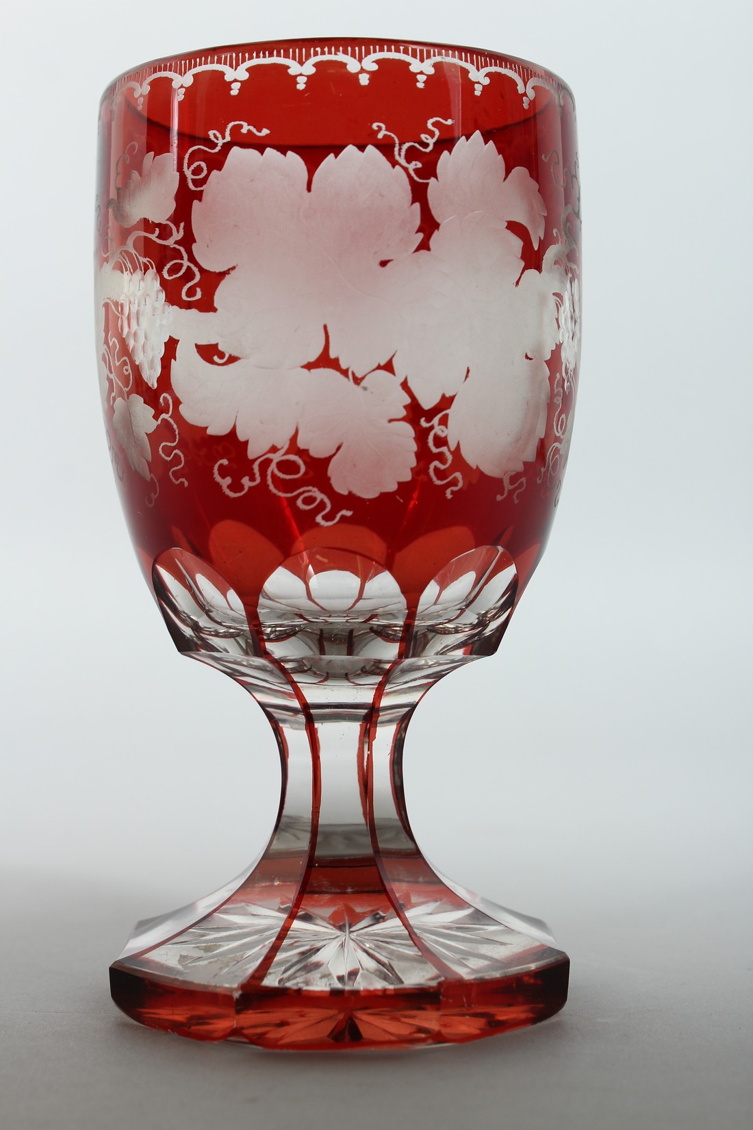 A GOOD BOHEMIAN GOBLET ENGRAVED WITH FRUITING VINES on an octagonal base. 5.5ins high. - Image 3 of 7