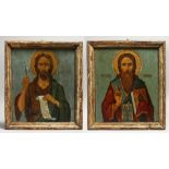 A GOOD RUSSIAN ICON OF A SAINT, double sided, framed. 12ins x 10ins