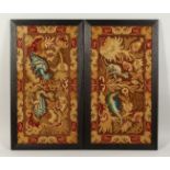 A PAIR OF GROS POINT EMBROIDERIES, dragon type creatures, framed and glazed.