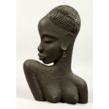 A CAST IRON BUST OF AN AFRICAN WOMAN. 14ins.