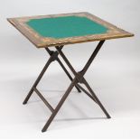 AN UNUSUAL EDWARDIAN MAHOGANY AND MARQUETRY INLAID FOLDING GAMES TABLE, with a baize lined
