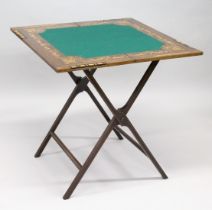 AN UNUSUAL EDWARDIAN MAHOGANY AND MARQUETRY INLAID FOLDING GAMES TABLE, with a baize lined