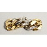 AN 18CT GOLD DIAMOND SET CHAIN LINK RING