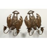 A GOOD PAIR OF BRONZE BAT SCONCES with double scrolling branches. 14ins