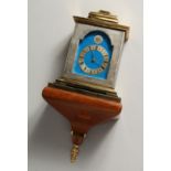 A VERY GOOD TWAITES REED MINIATURE BRACKET CLOCK AND BRACKET with silvered dial and blue background,