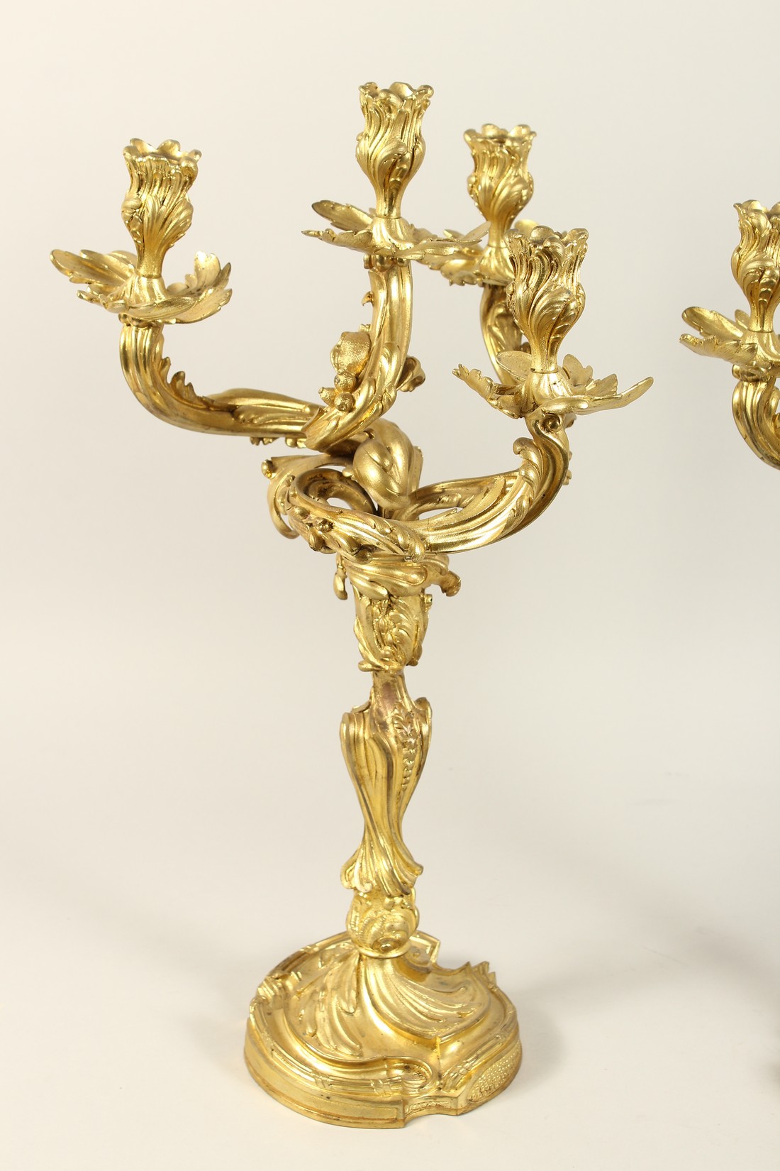 A GOOD PAIR OF ROCOCCO ORMOLU FOUR LIGHT CANDELABRA, with four naturalistic scrolling branches on - Image 4 of 5