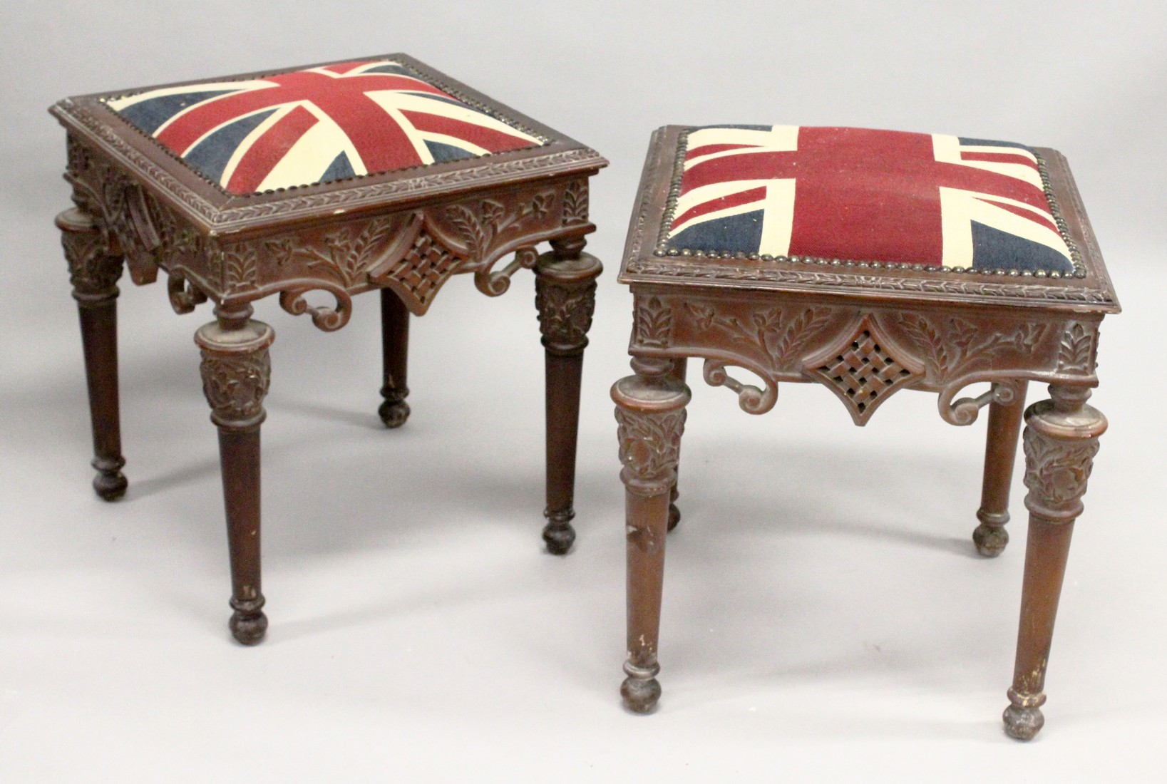 A PAIR OF UNION JACK STOOLS 22ins high.