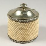 A GOOD 19TH CENTURY HOBNAIL CUT OVAL IVORY TEA CADDY with plated mounts and lid 5.5ins high