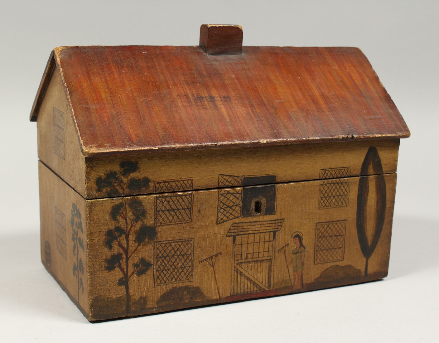 A RARE TWO DIVISION HOUSE/ COTTAGE TEA CADDY, the front painted with door, windows, a woman