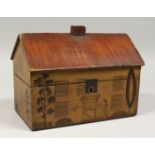 A RARE TWO DIVISION HOUSE/ COTTAGE TEA CADDY, the front painted with door, windows, a woman