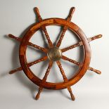 A SHIP'S WHEEL.