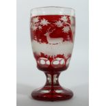A GOOD BOHEMIAN GOBLET engraved with deer in a landscape on a circular base. 5.5ins high.