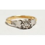 AN 18CT GOLD SINGLE STONE DIAMOND RING.