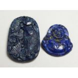 TWO CARVED LAPIS PENDANTS