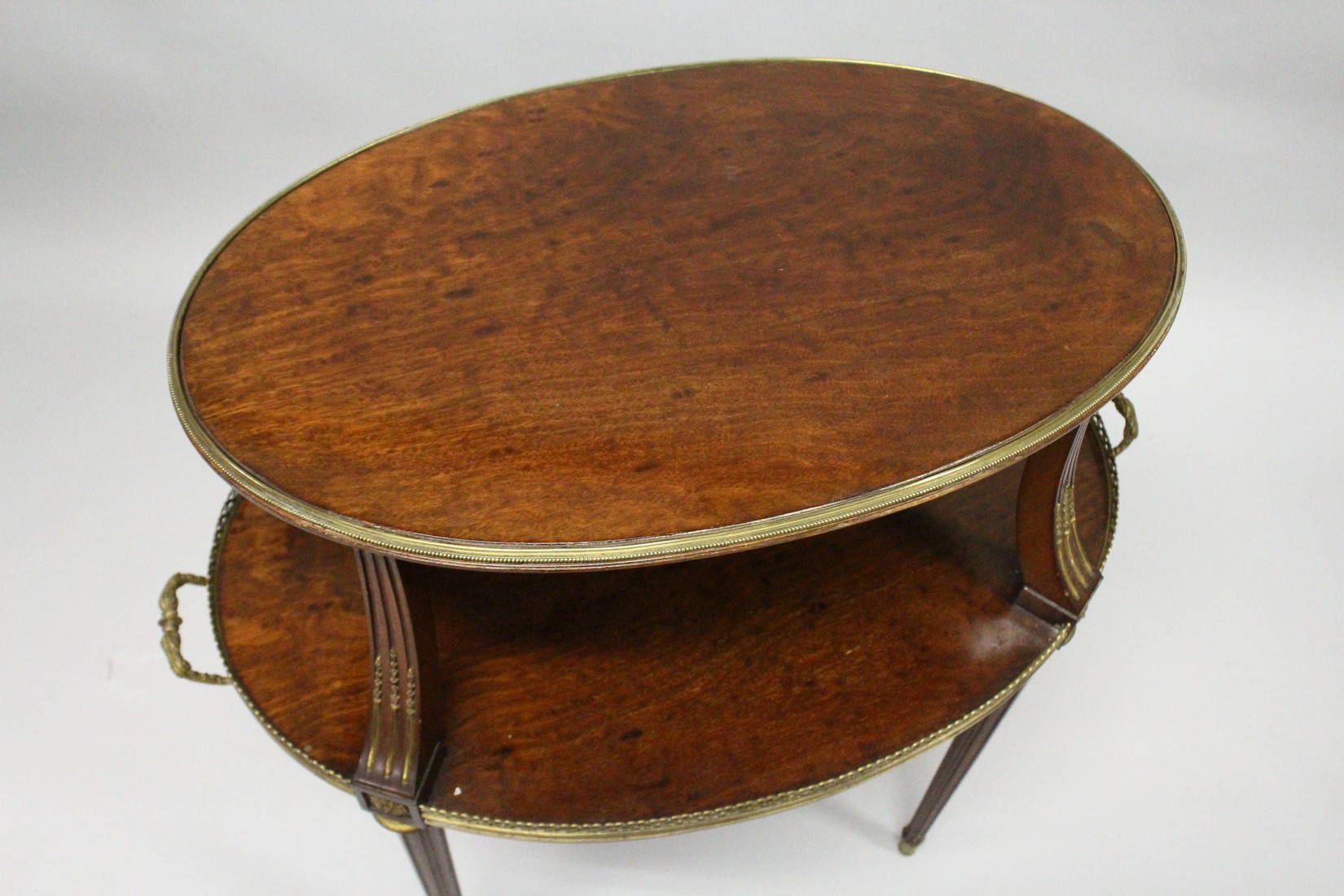 A VERY GOOD 19TH CENTURY MAHOGANY OVAL AND TWO TIER ETAGERE, with brass banding and gallery on - Image 3 of 6